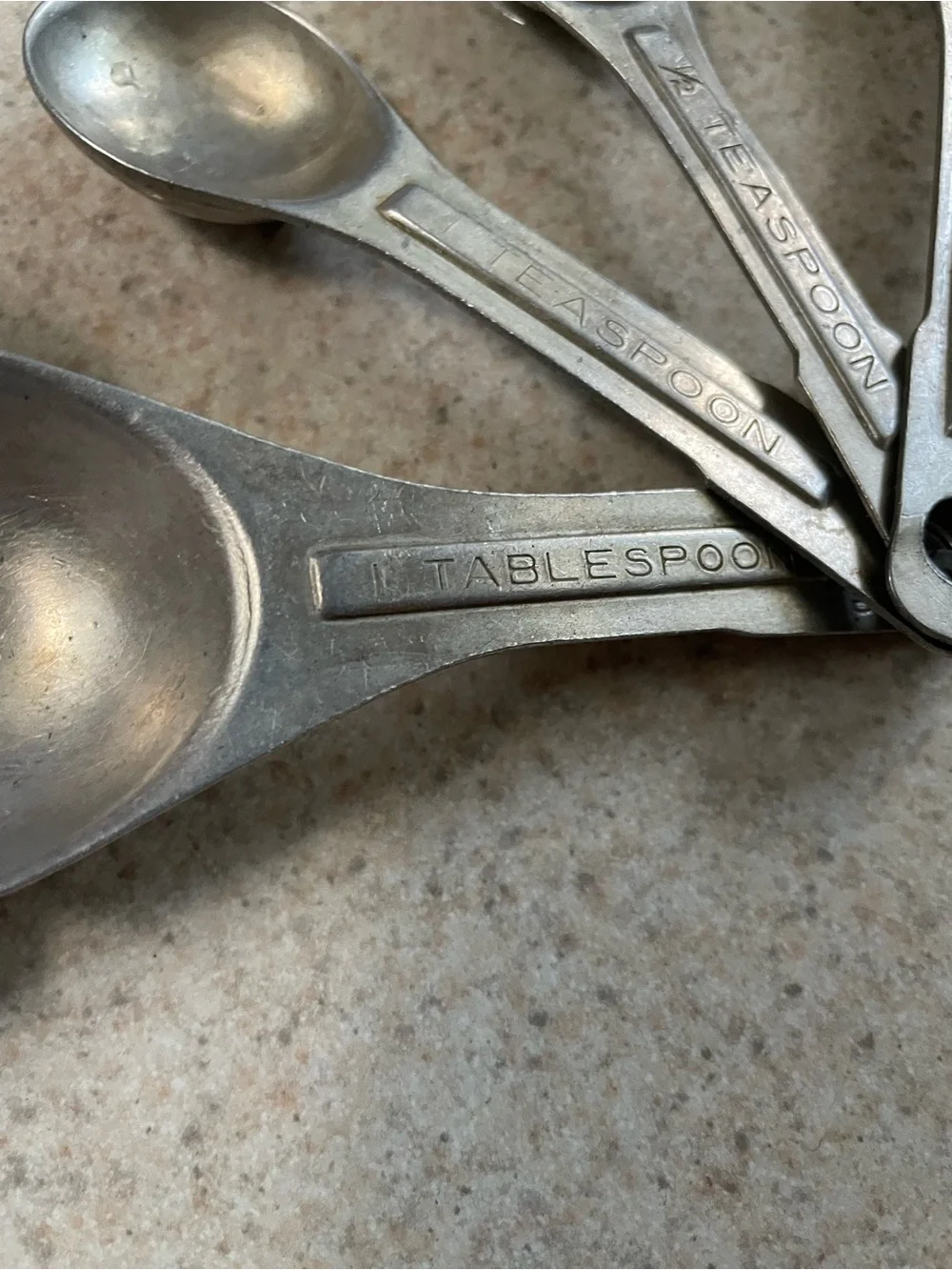 Vintage U.S.ST'D Aluminum Metal Measuring Spoons Oval Nesting Set of 4 on Ring